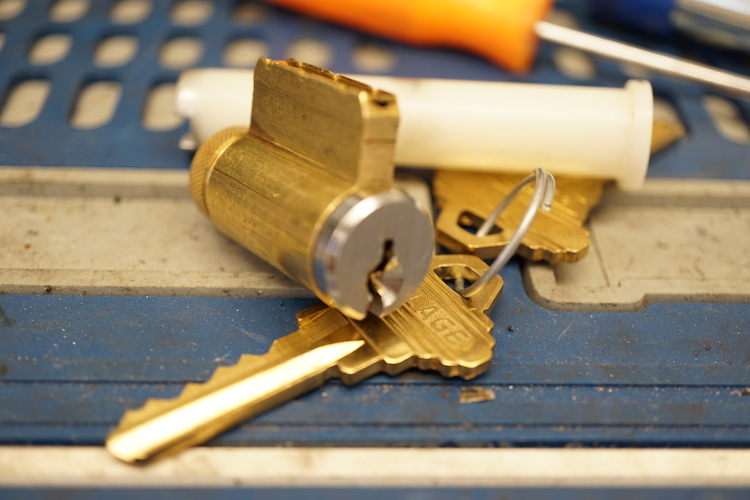 lock cylinder ready to be rekeyed by the locksmith